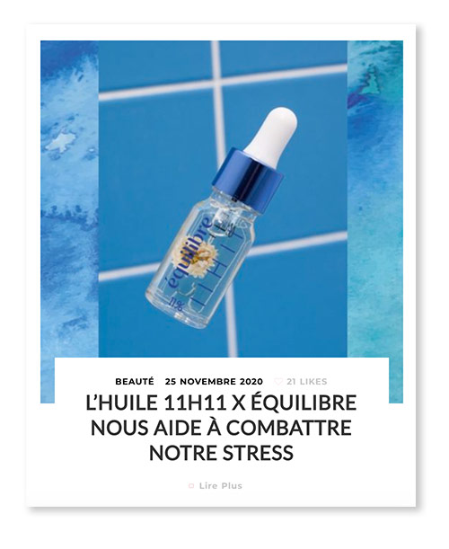 Flacon huile CBD 11% de la collaboration Equilibre CBD et 11H11, avec un fond carrelage bleu